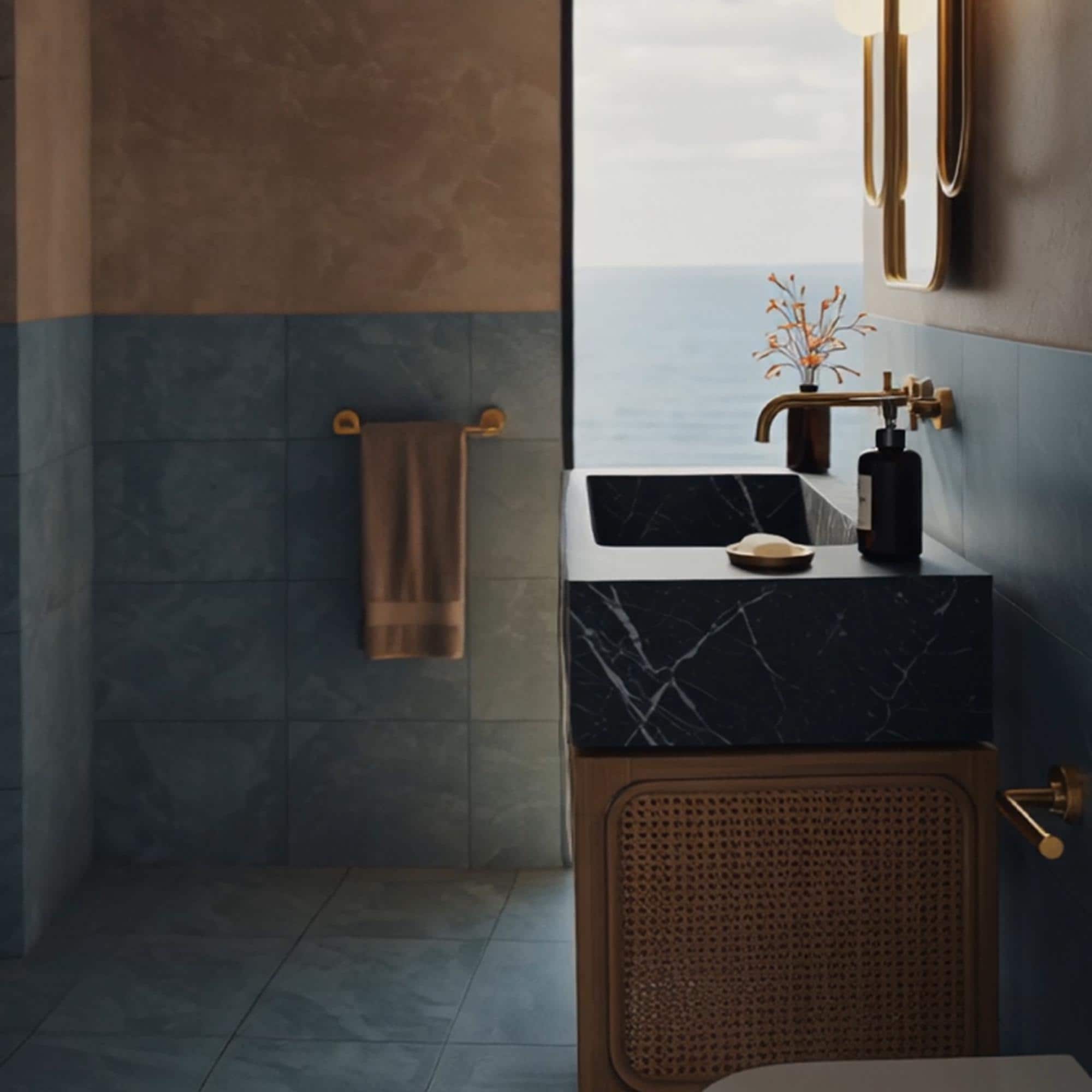 This fluted black marble sink rests on a handcrafted woven rattan cabinet, delivering texture-rich luxury to any space.