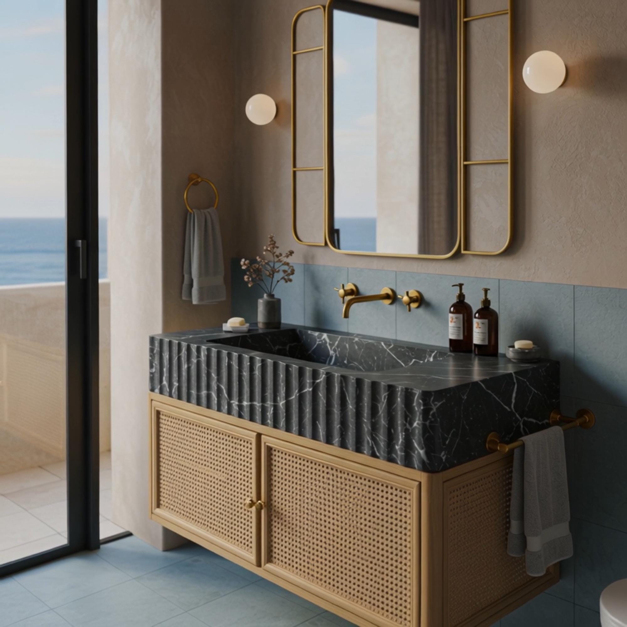 This fluted marble sink unit with rattan storage offers a unique blend of contemporary edge and earthy elegance.