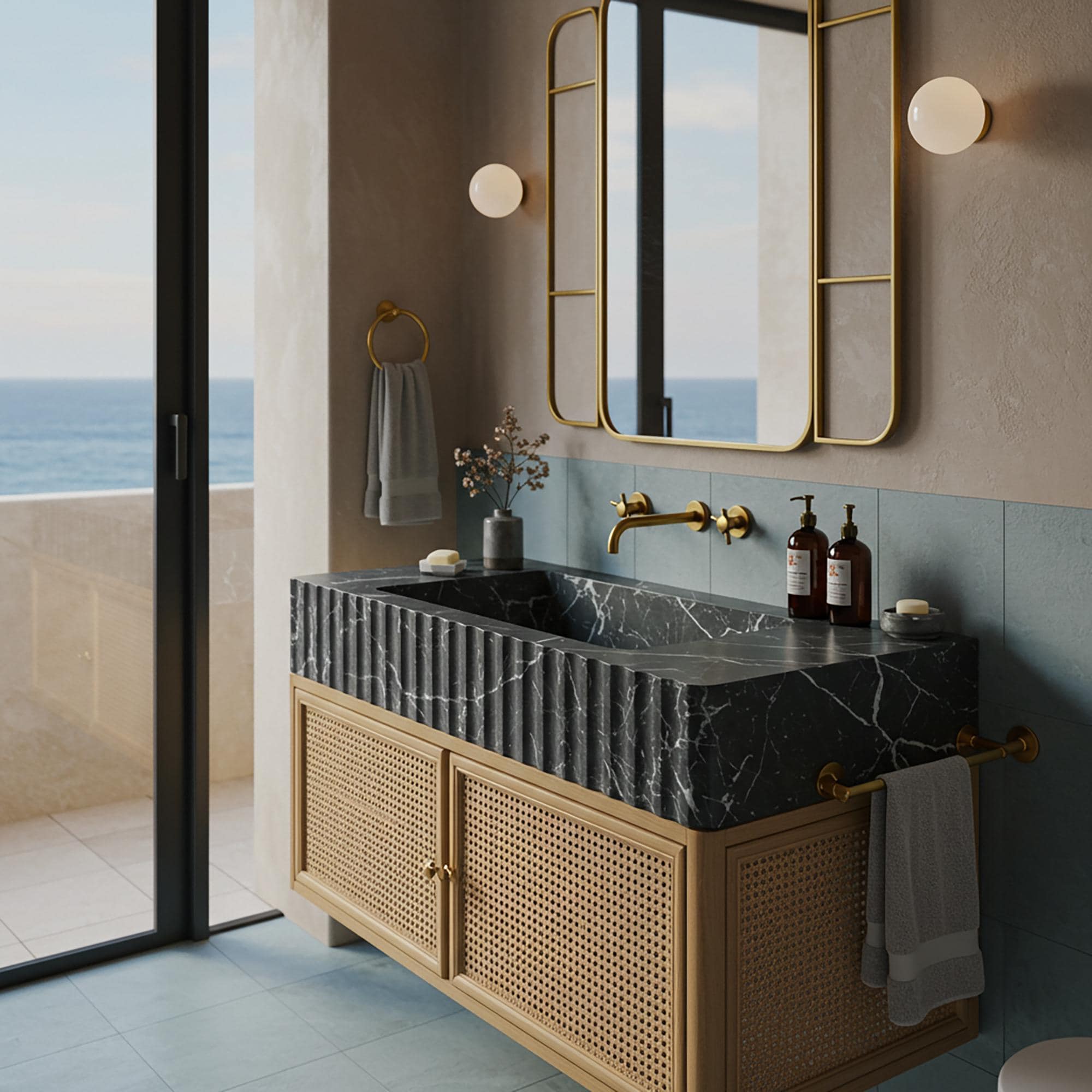 A luxurious floating vanity featuring deep-toned fluted marble and a handcrafted rattan cabinet front.