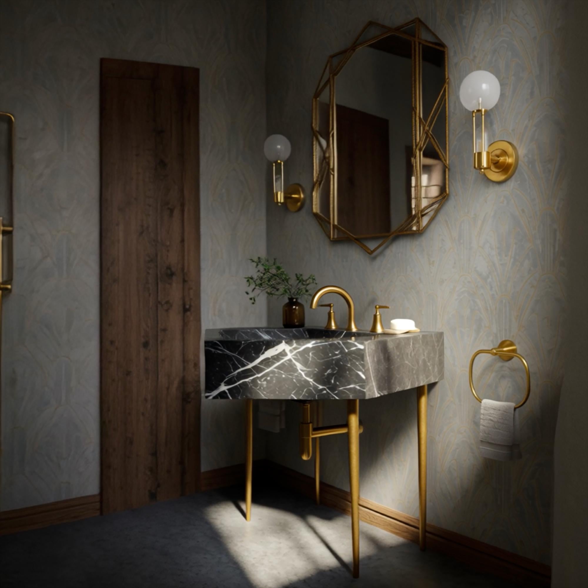 A diamond-shaped Nero Marquina marble console sink elevated on brass legs, offering a timeless architectural bathroom statement.
