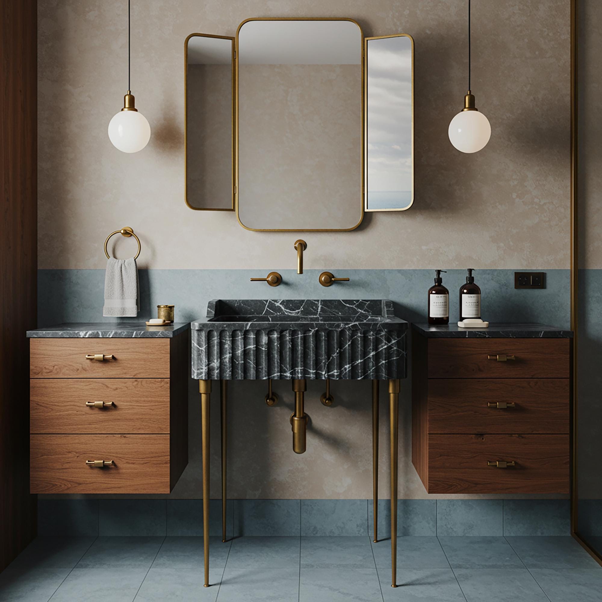 A Pietre Notte marble fluted console sink with dramatic white veining, paired with brass legs and floating wooden side cabinets in a refined bathroom setting.
