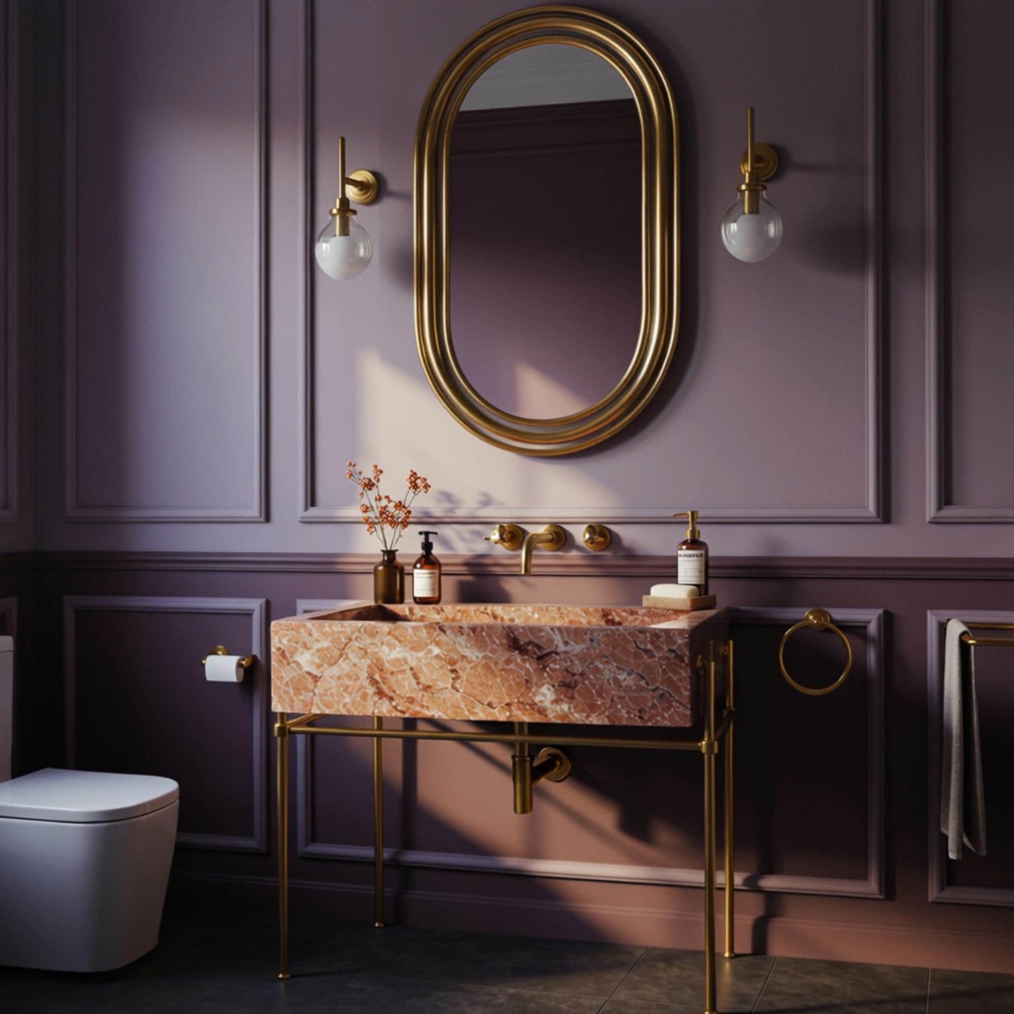 This console vanity blends pink marble and brass accents, adding warmth and sophistication to any luxury bath.